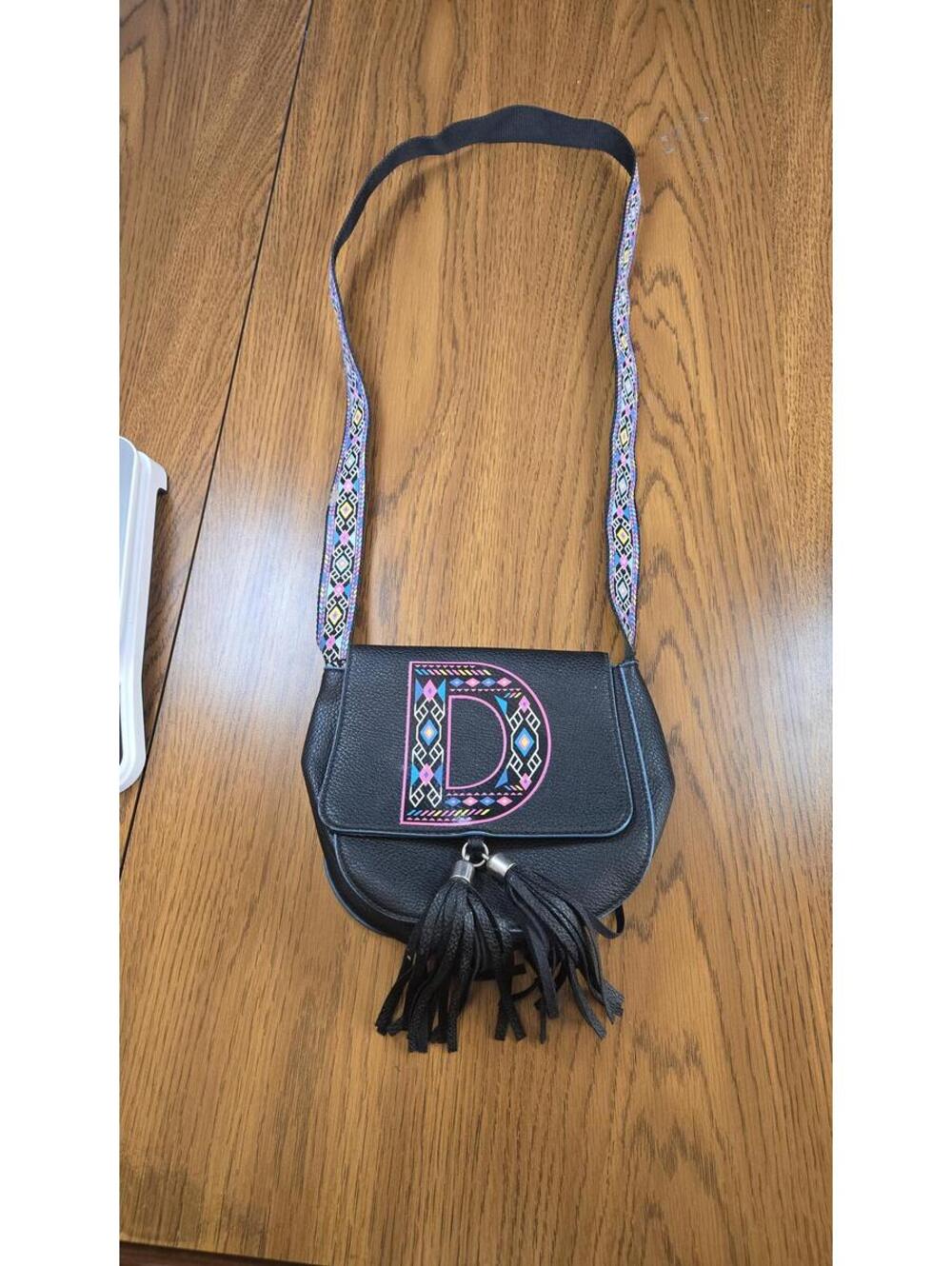 Justice Black Crossbody Bag with Colorful Patterned Strap and Tassels - Picture 1 of 7